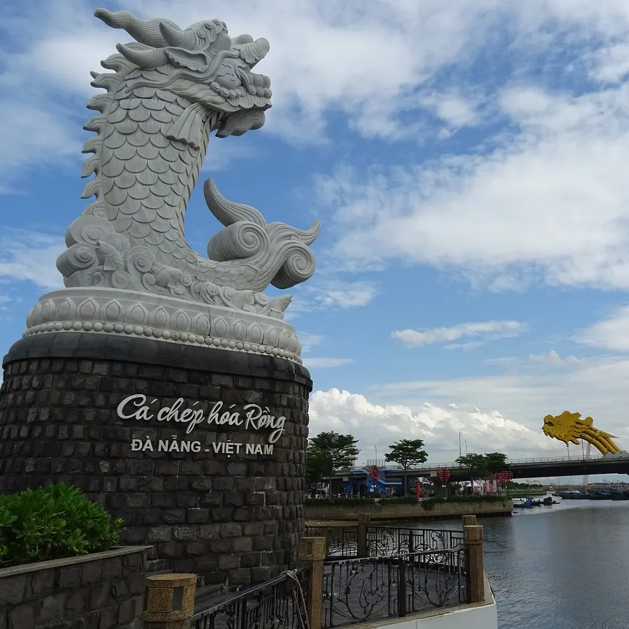 The white marble carp turning into a dragon on the Han River bank, the Dragon Bridge behind it